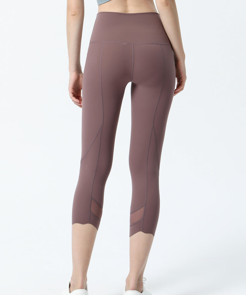 High-Rise Mesh Insert Capri Legging by bornfocus