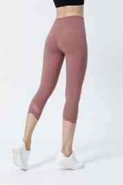 High-Rise Mesh Insert Capri Legging by bornfocus