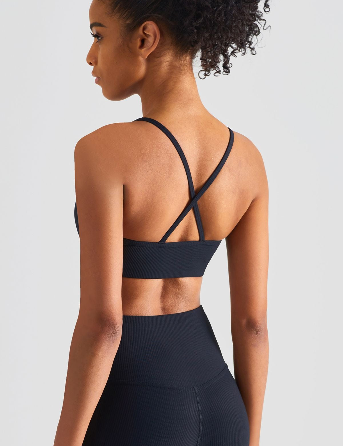 Ribbed Crossover Sports Bra by bornfocus