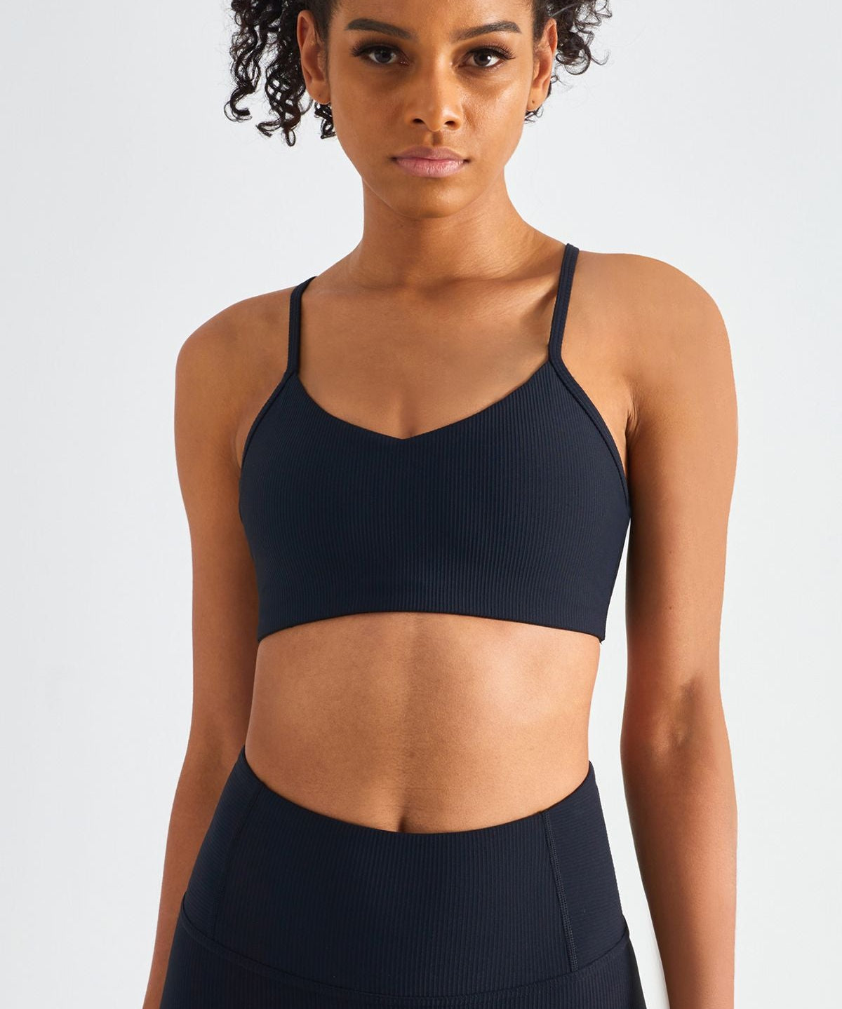 Ribbed Crossover Sports Bra by bornfocus