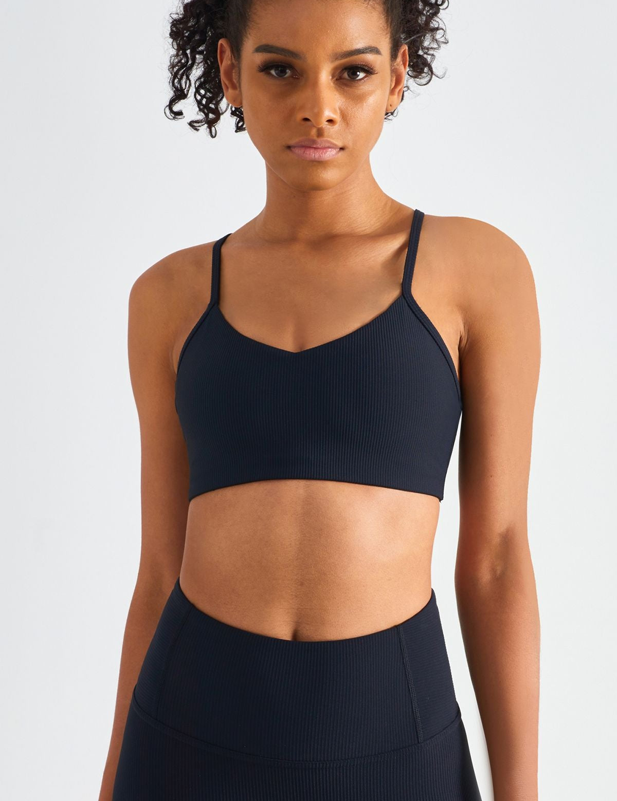 Ribbed Crossover Sports Bra by bornfocus