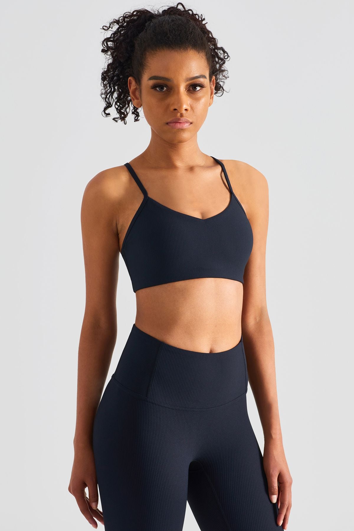 Ribbed Crossover Sports Bra by bornfocus