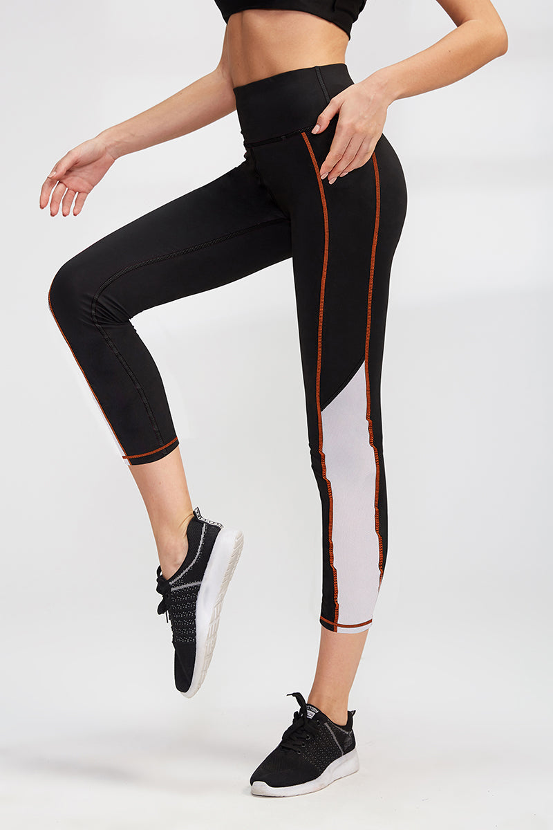 High-Rise Mesh Insert Capri Legging by bornfocus