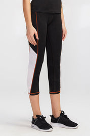 High-Rise Mesh Insert Capri Legging by bornfocus