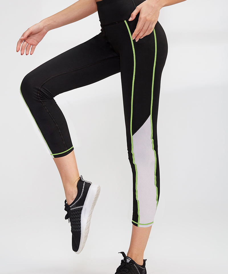 High-Rise Mesh Insert Capri Legging by bornfocus