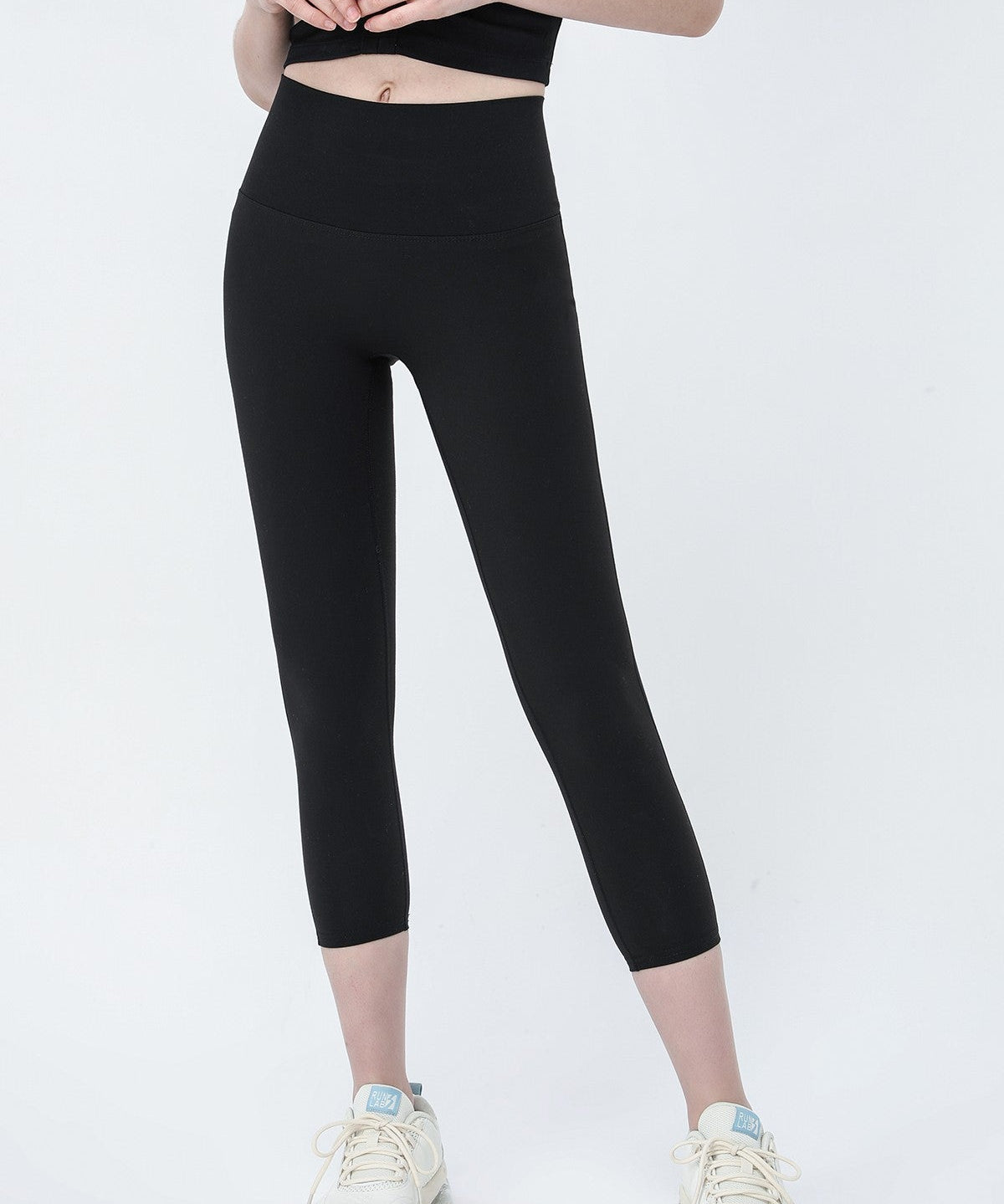 High-Rise Capri Leggings by bornfocus