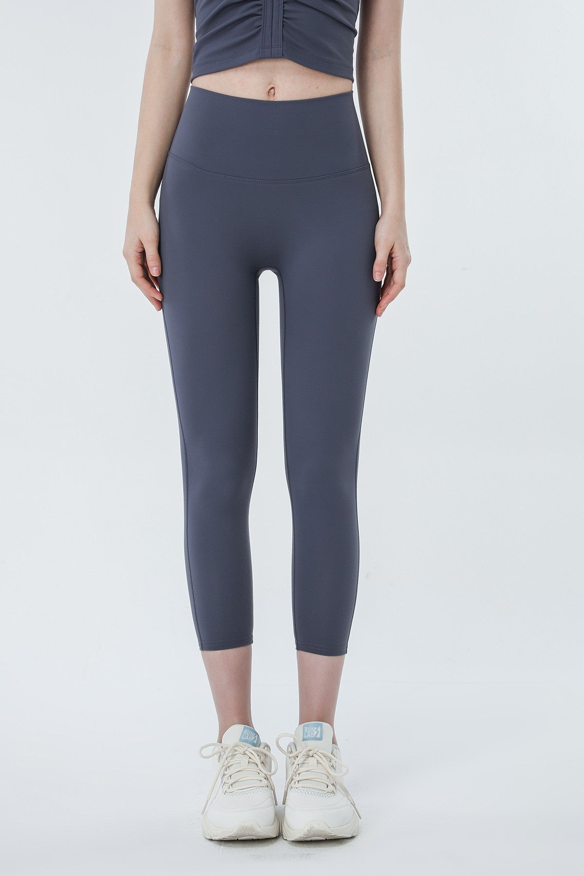 High-Rise Capri Leggings by bornfocus