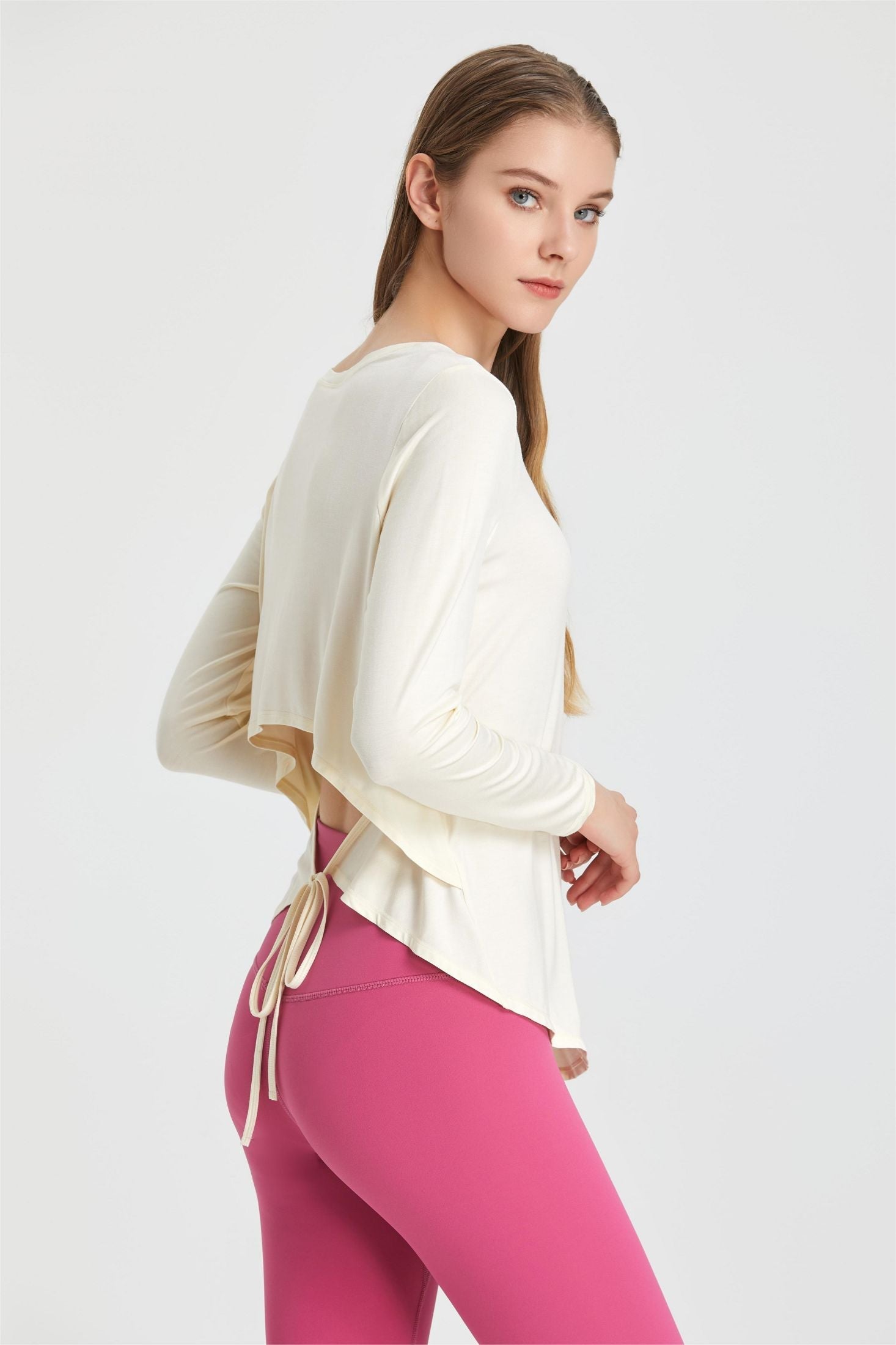 Back Waist Cutout Tie Long Sleeve T-Shirt by bornfocus