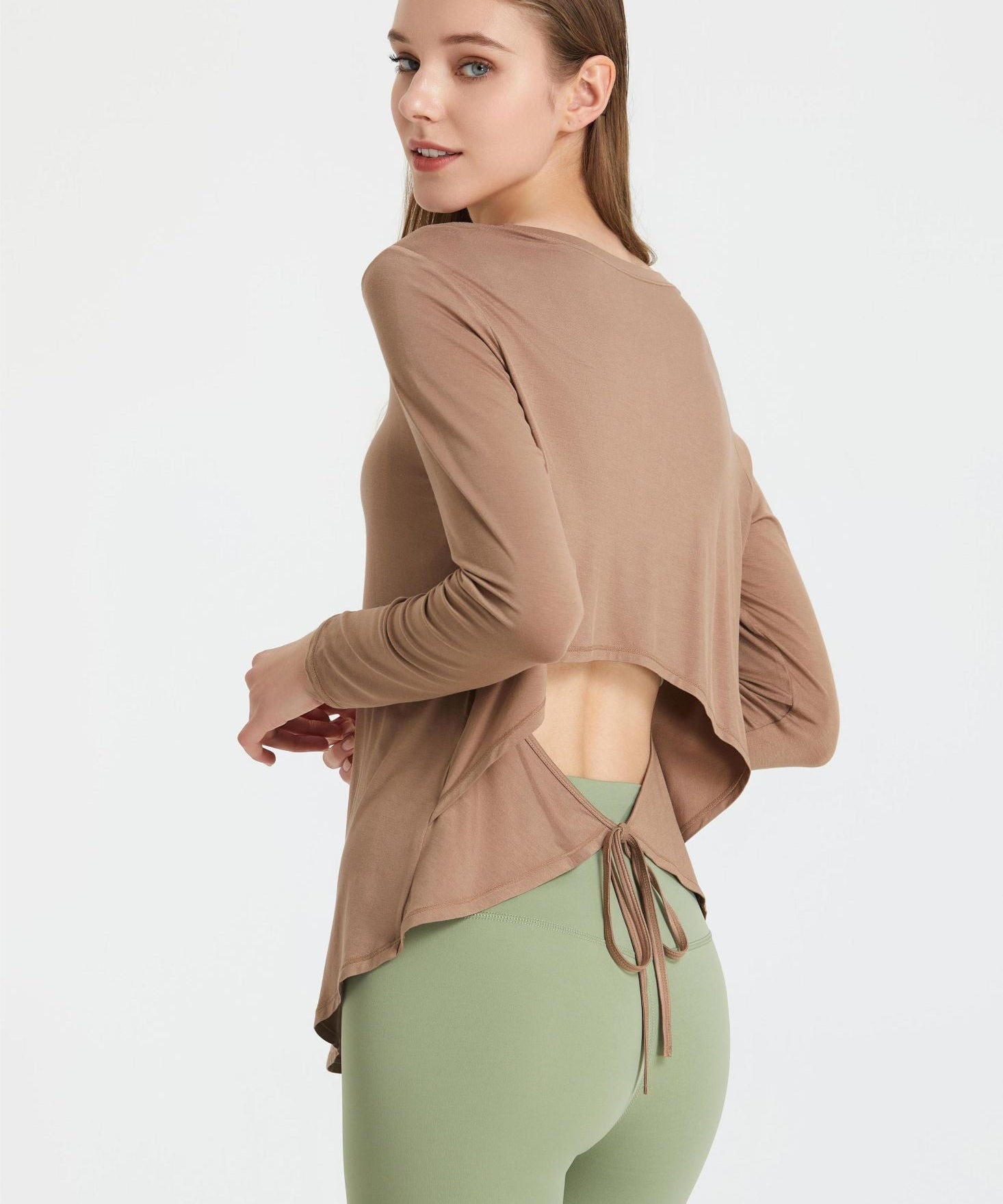 Back Waist Cutout Tie Long Sleeve T-Shirt by bornfocus