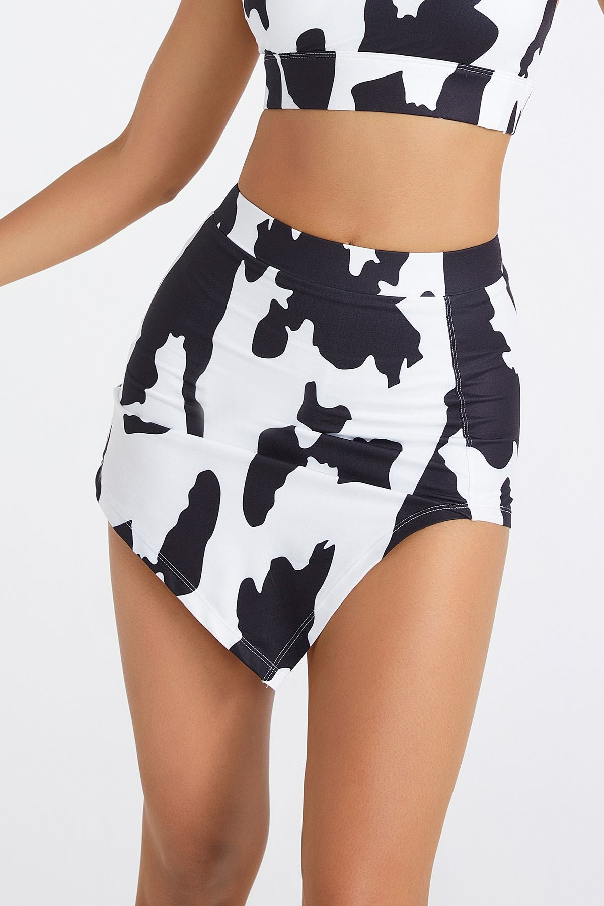 Cow Print Asymmetrical Mini Skirt by bornfocus