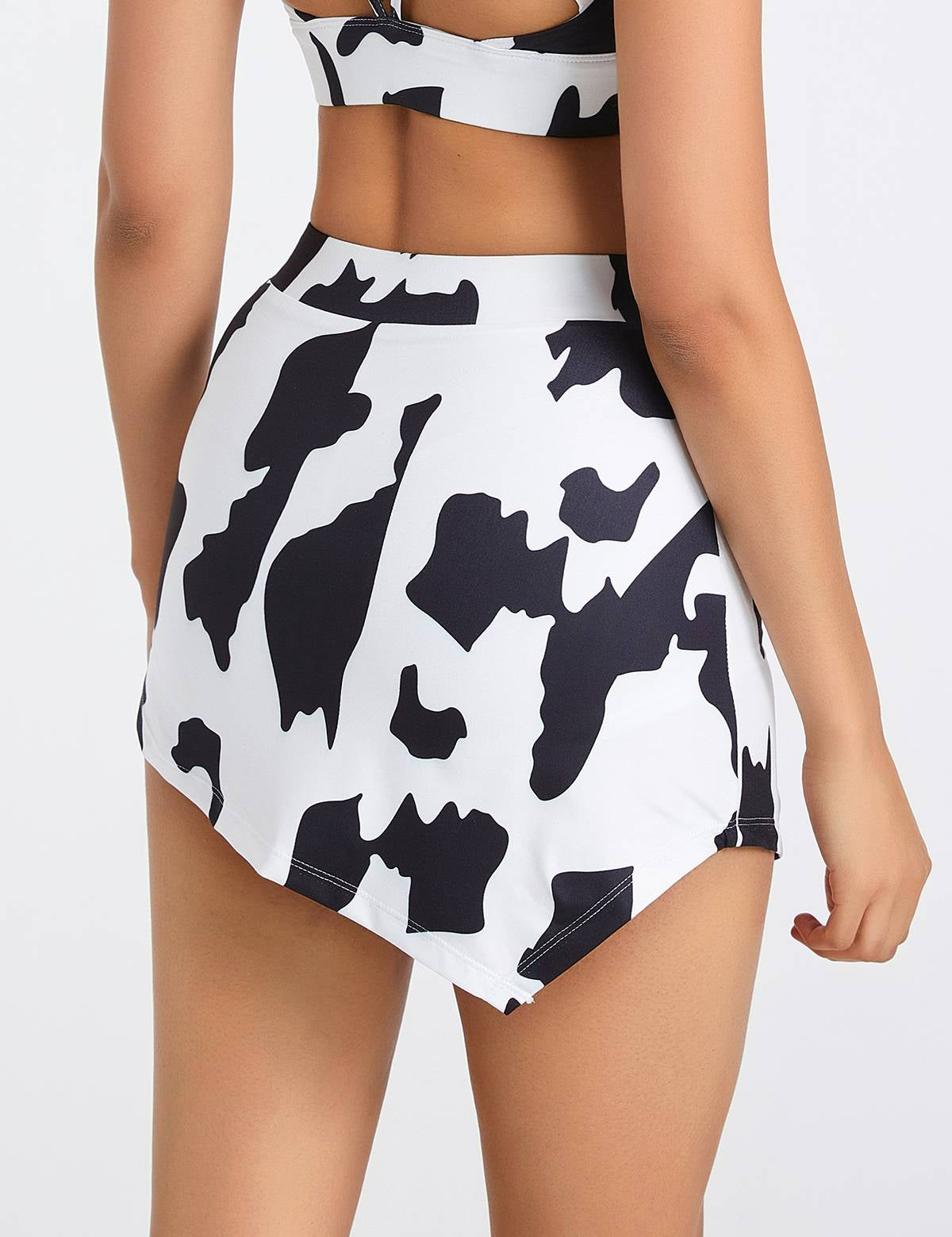 Cow Print Asymmetrical Mini Skirt by bornfocus