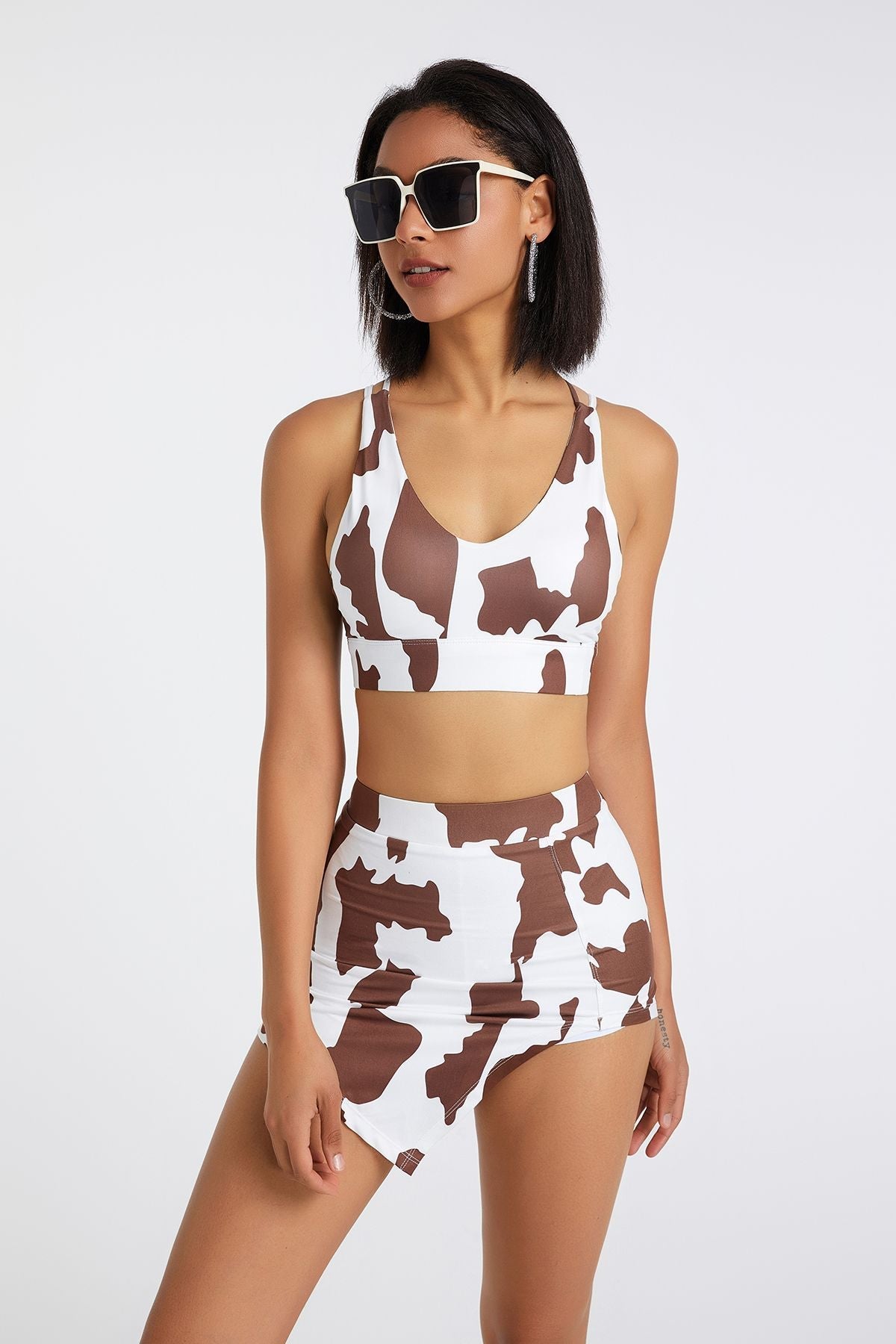 Cow Print Asymmetrical Mini Skirt by bornfocus