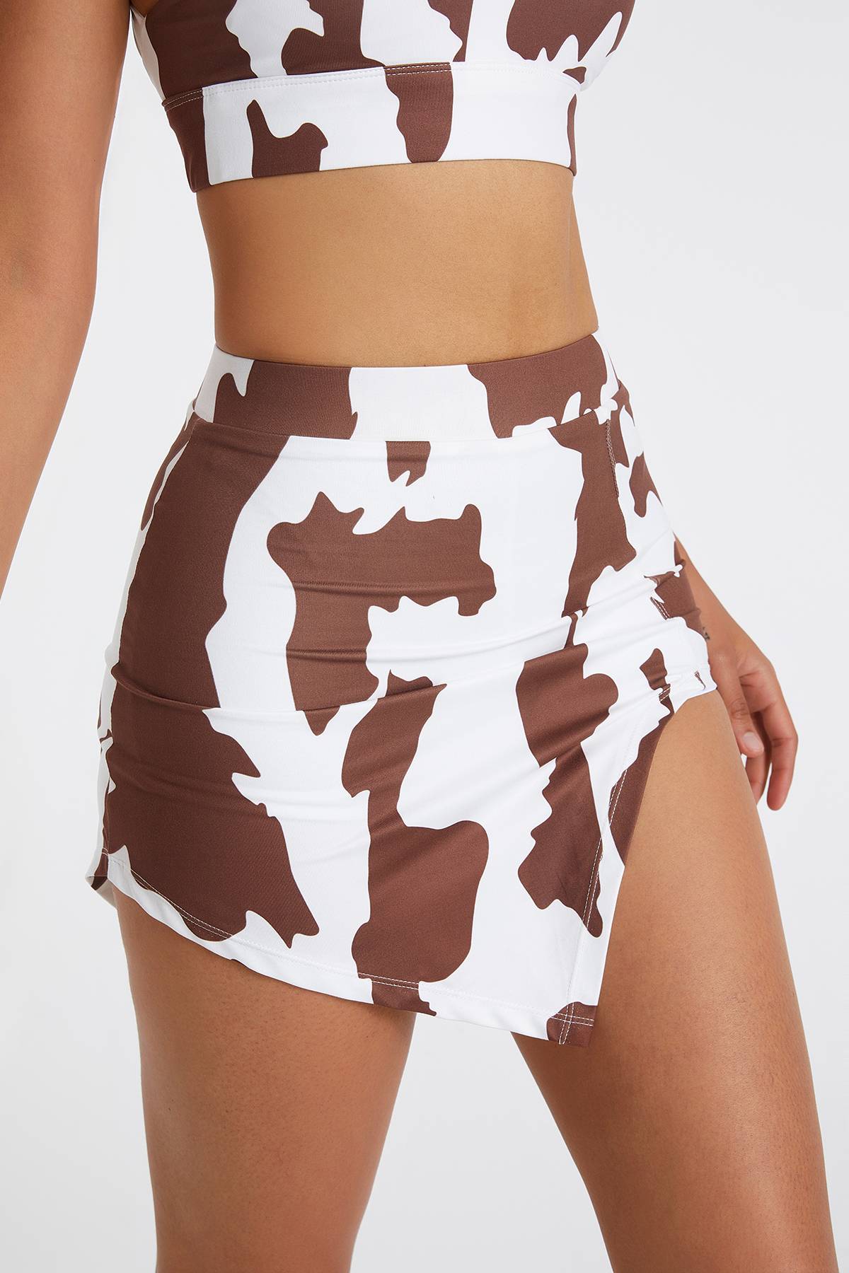 Cow Print Asymmetrical Mini Skirt by bornfocus