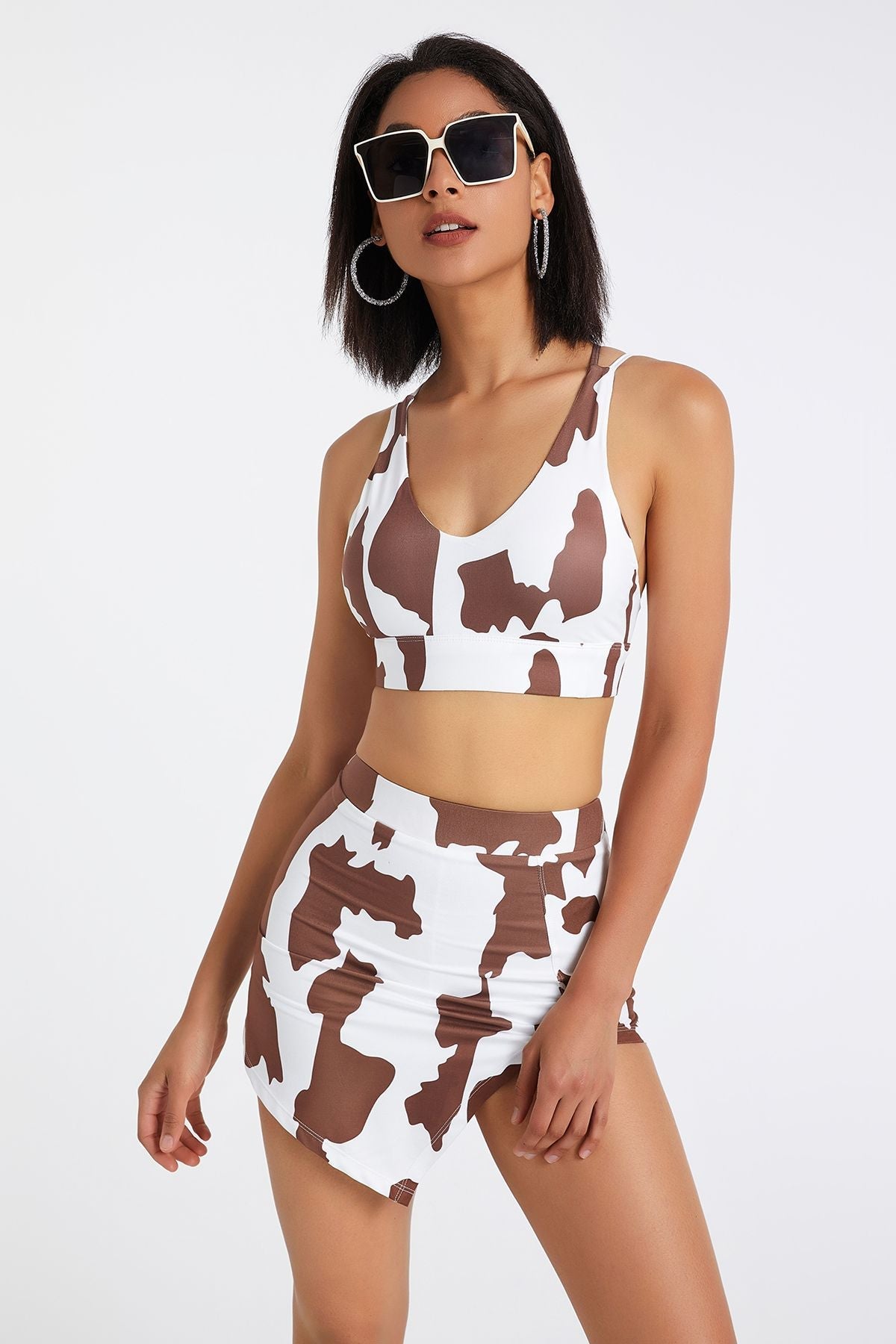 Cow Print Strappy Sports Bra by bornfocus