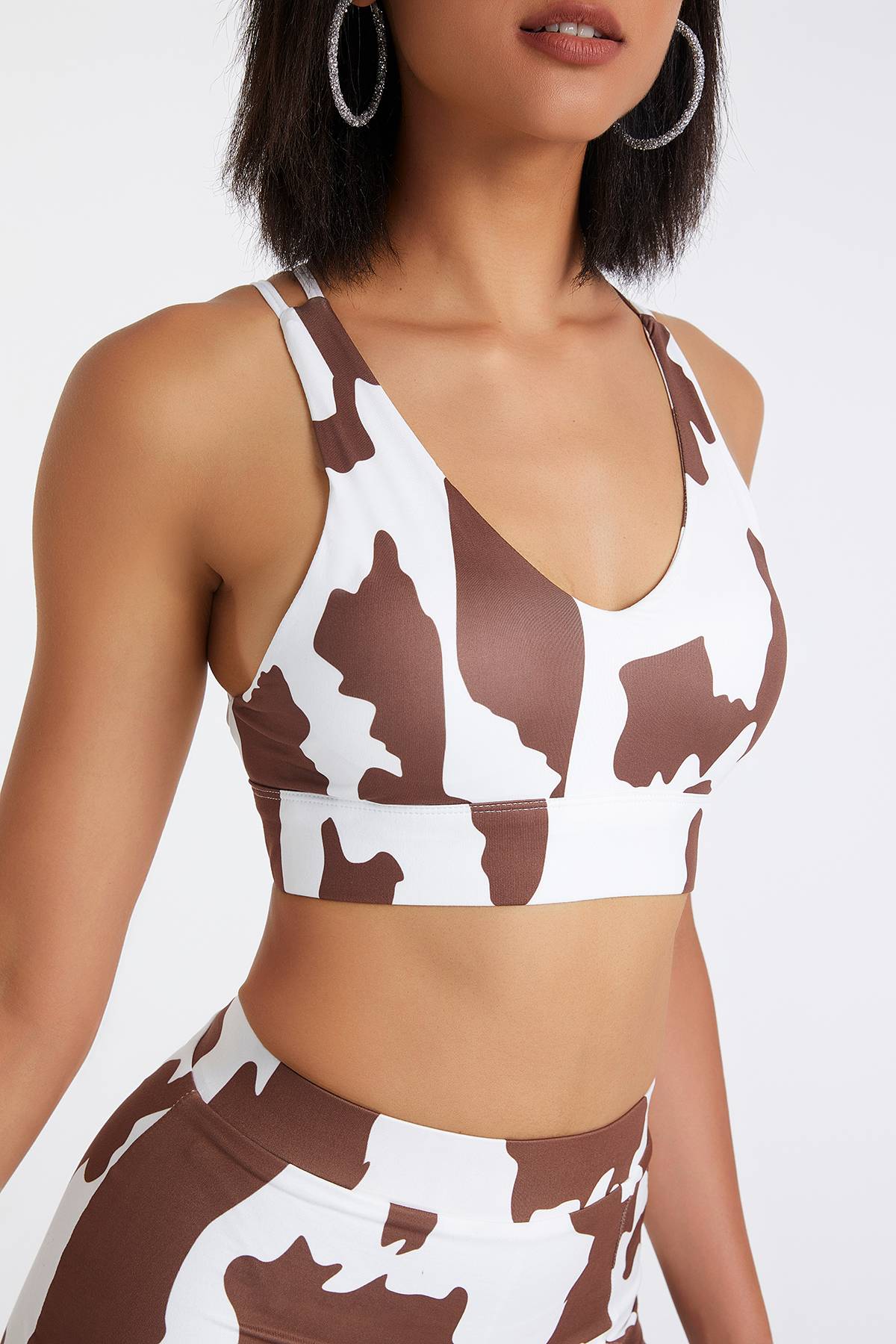 Cow Print Strappy Sports Bra by bornfocus