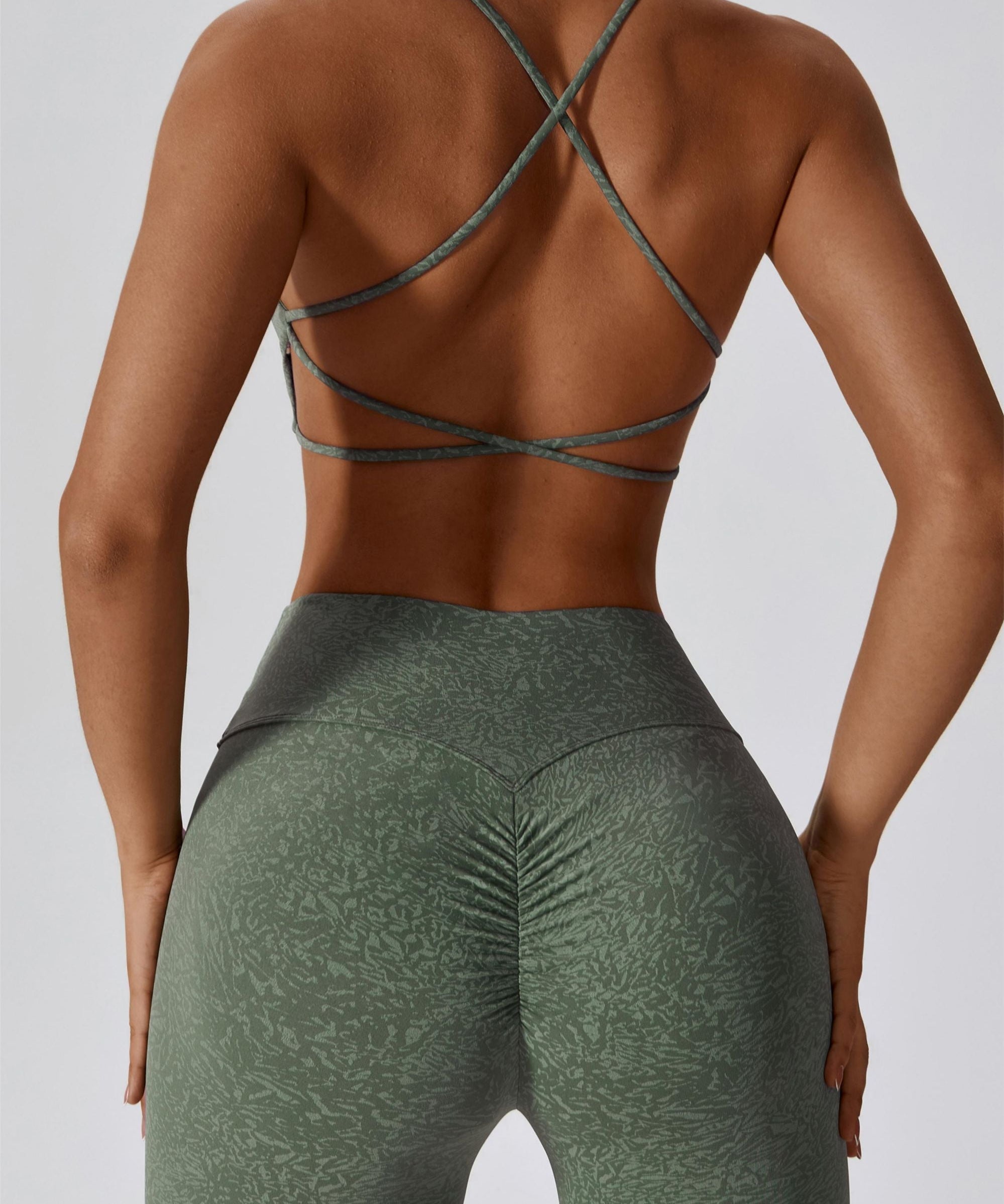 Patterned Twist Deep-V Strappy Sports Bra by bornfocus