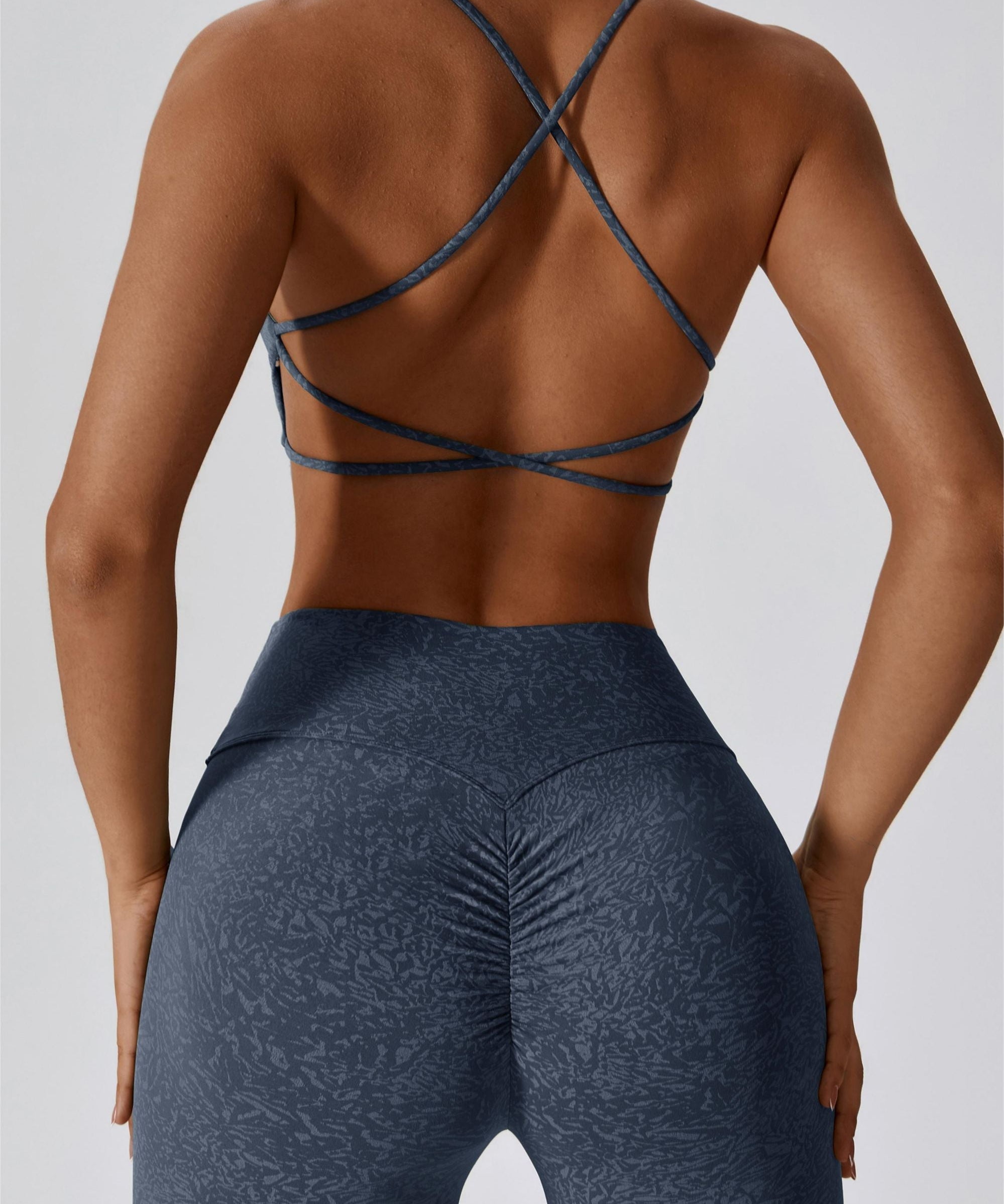 Patterned Twist Deep-V Strappy Sports Bra by bornfocus