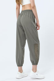 Mesh Panel Jogger Pants by bornfocus