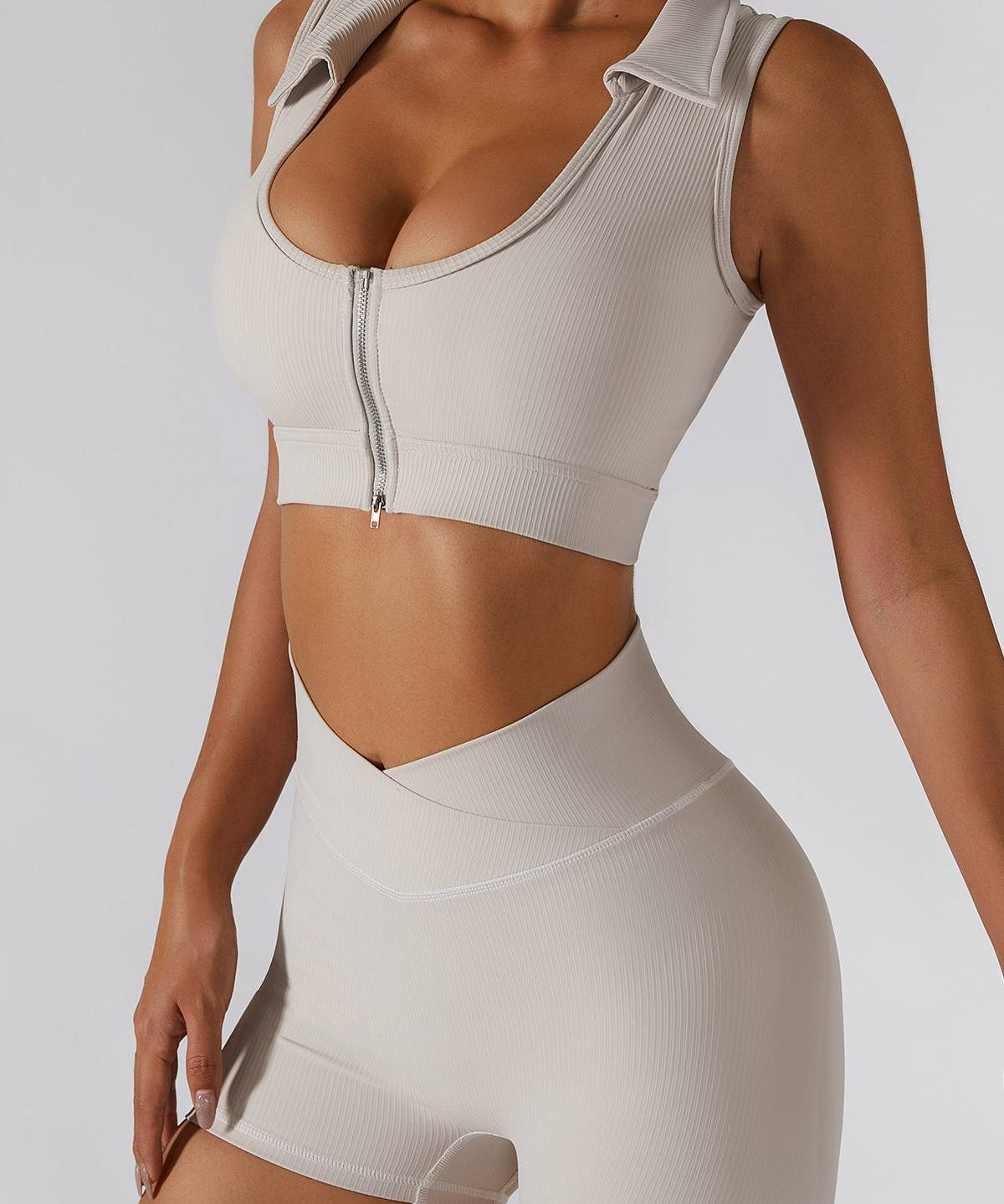 Ribbed Zip Front Plunge Neckline Sports Bra by bornfocus