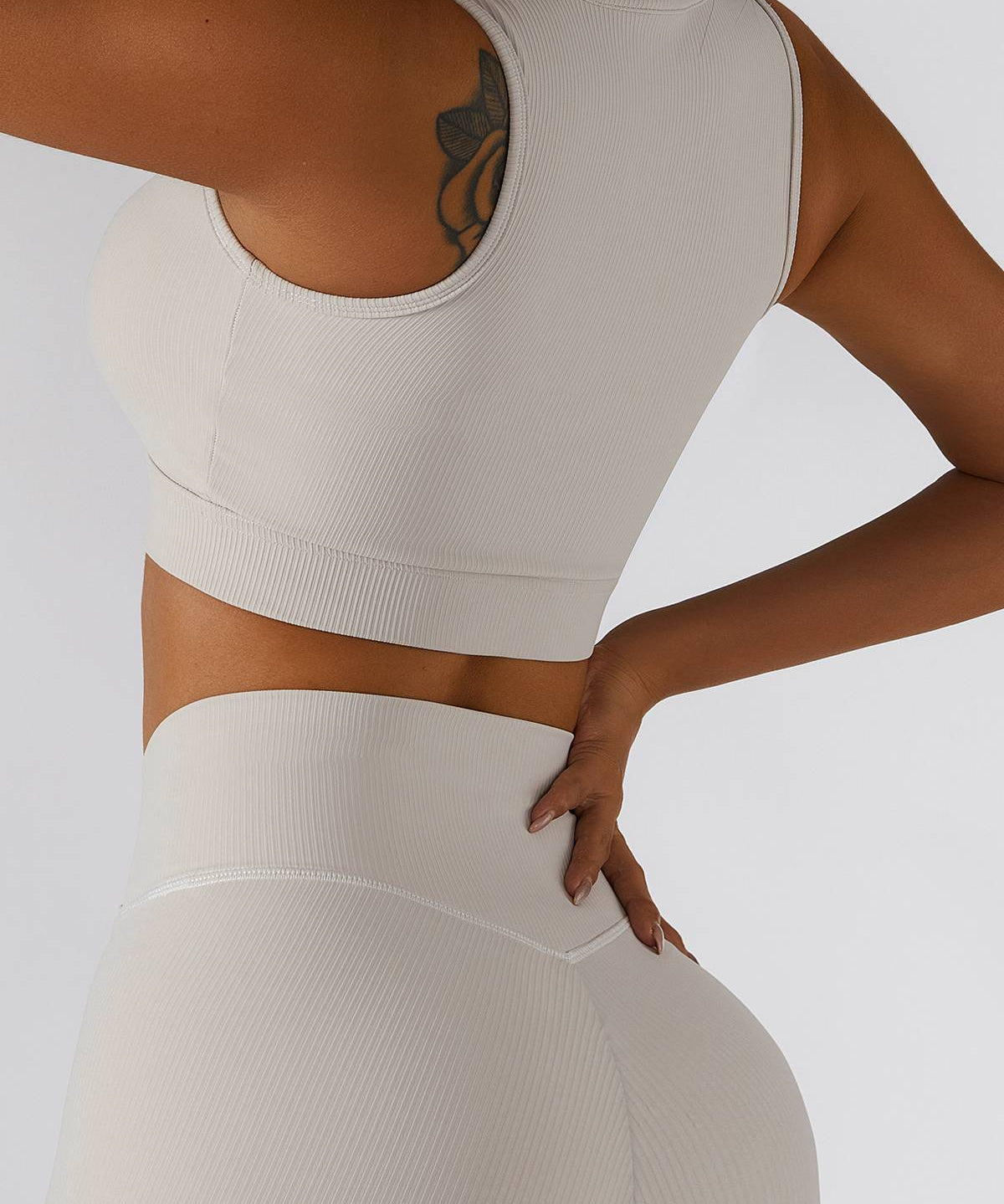 Ribbed Zip Front Plunge Neckline Sports Bra by bornfocus