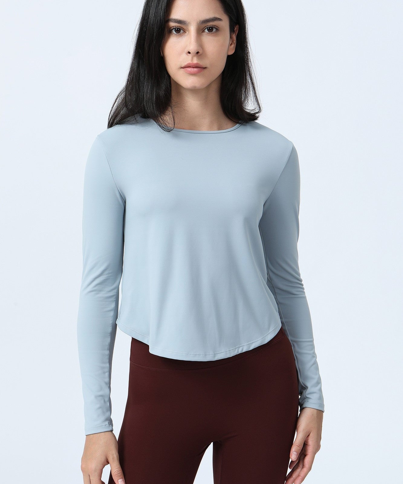 Long Sleeve Ruched Back Cutout Crop Top by bornfocus