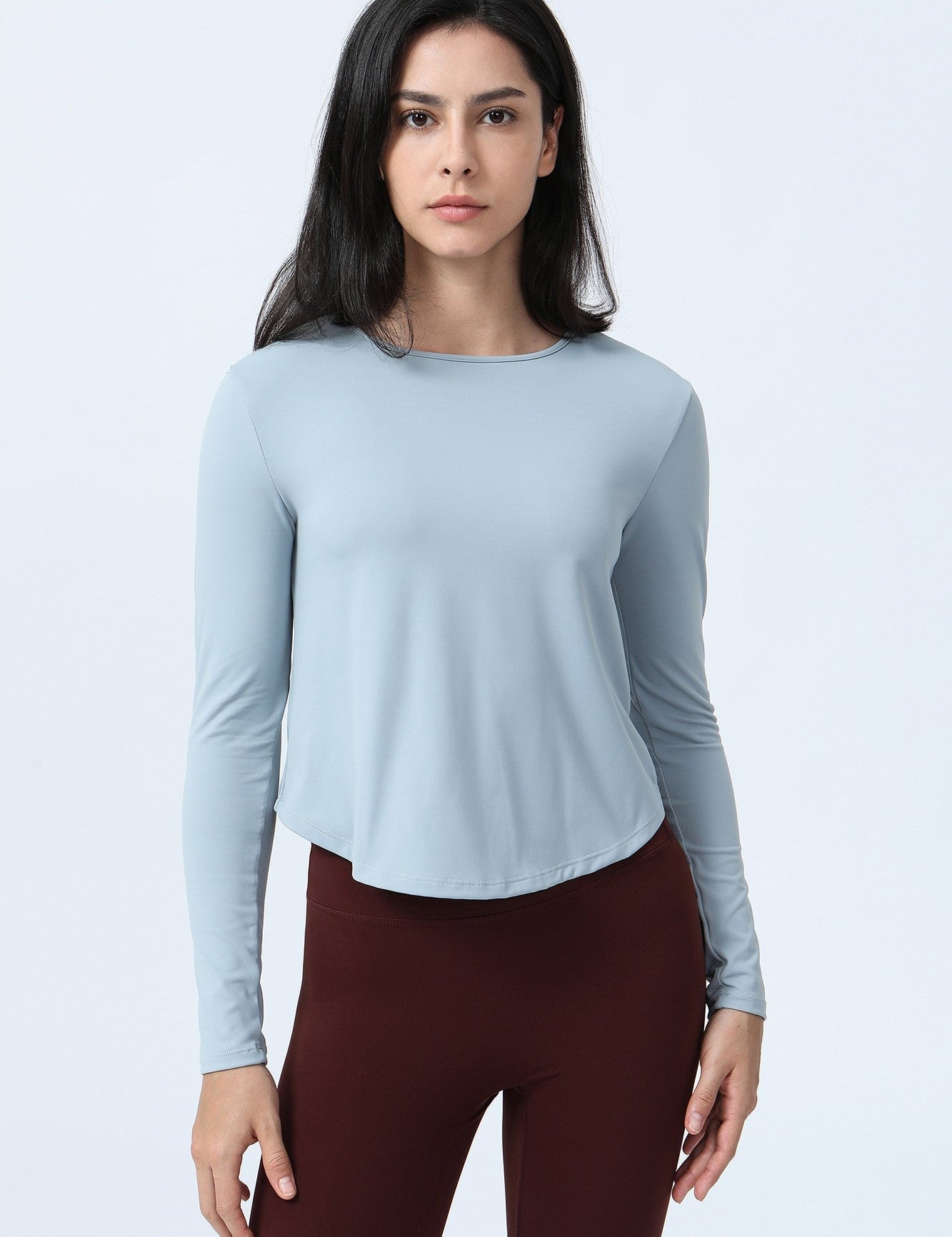 Long Sleeve Ruched Back Cutout Crop Top by bornfocus