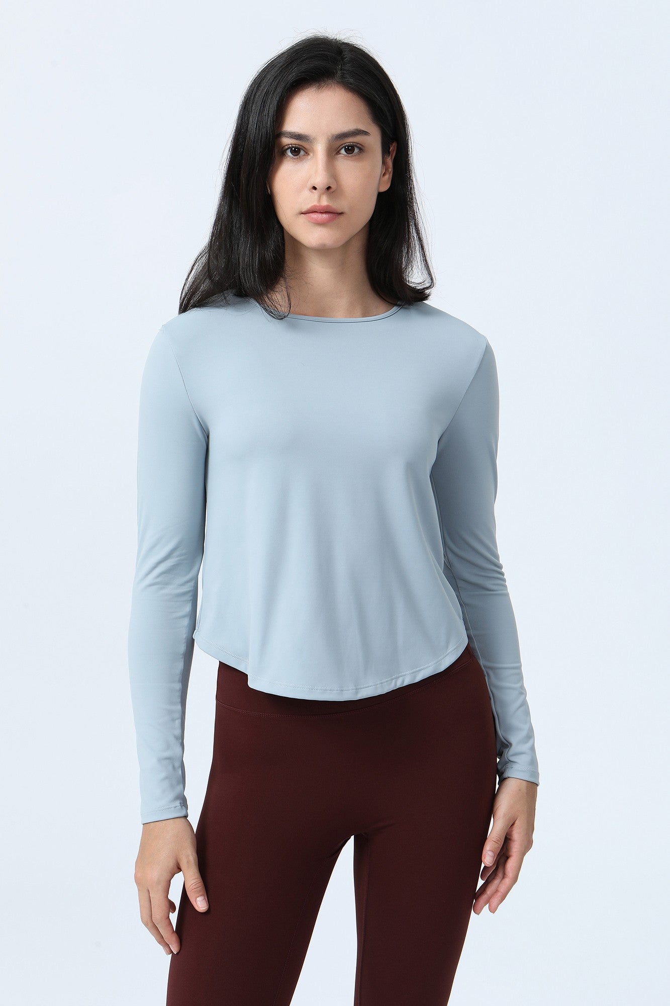 Long Sleeve Ruched Back Cutout Crop Top by bornfocus