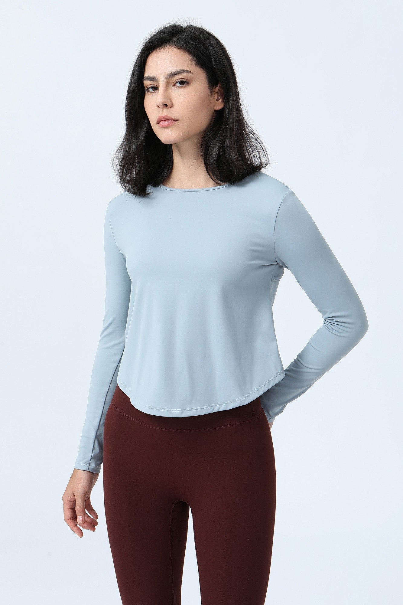 Long Sleeve Ruched Back Cutout Crop Top by bornfocus