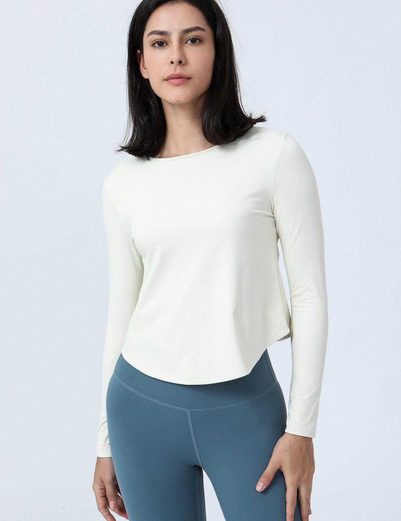 Long Sleeve Ruched Back Cutout Crop Top by bornfocus