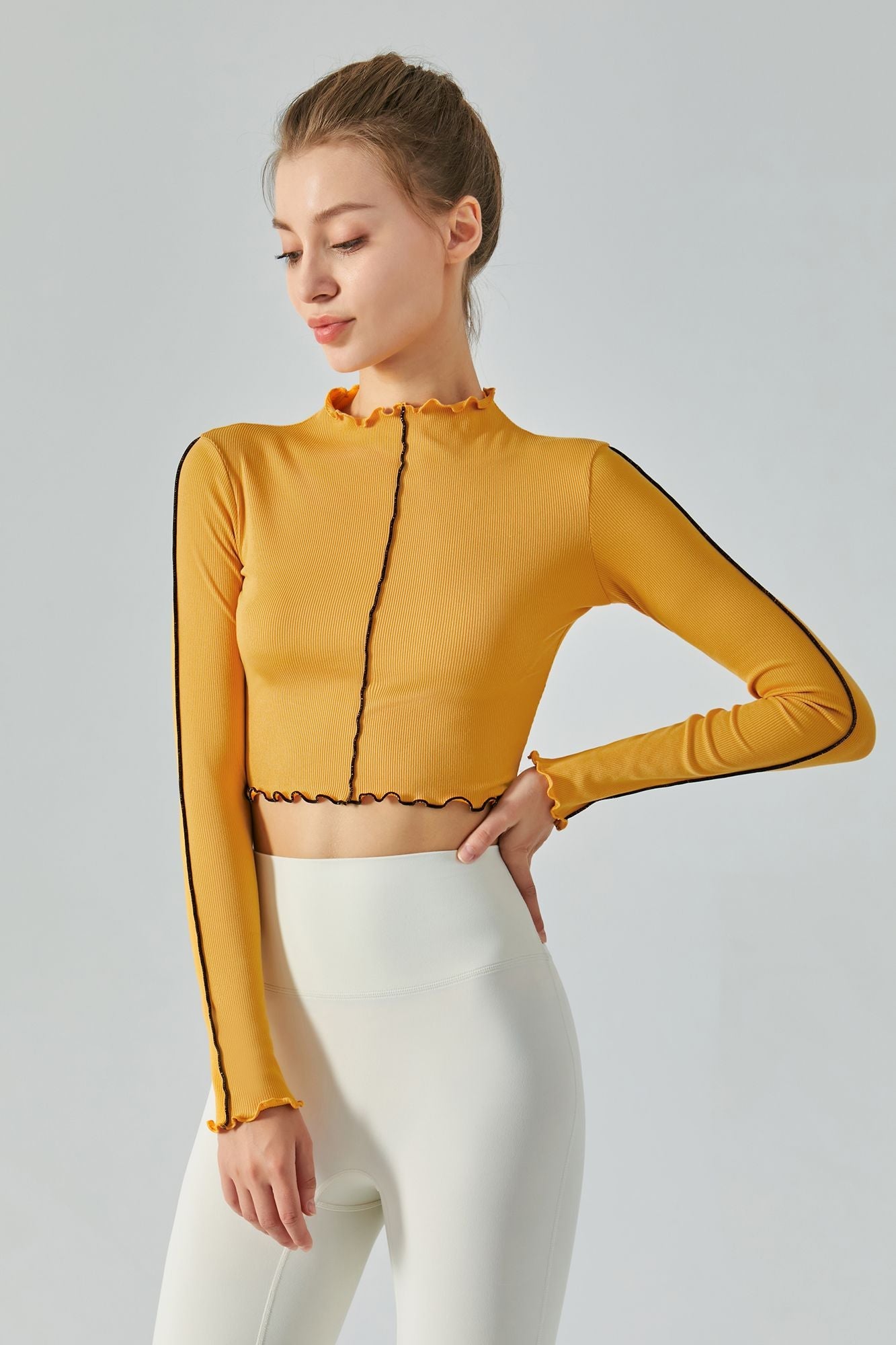 Ribbed Long Sleeve Contrast Lettuce Edge Crop Top by bornfocus